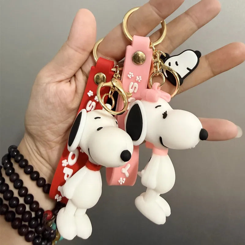 Cute and stylish new Snoopy cartoon dog design for 2026, can be used as a bag charm, backpack pendant, or car keychain.