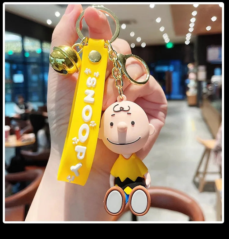 Cute and stylish new Snoopy cartoon dog design for 2026, can be used as a bag charm, backpack pendant, or car keychain.