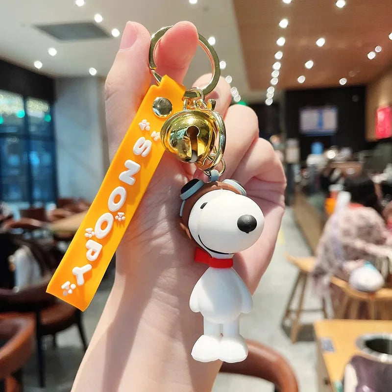 Cute and stylish new Snoopy cartoon dog design for 2026, can be used as a bag charm, backpack pendant, or car keychain.