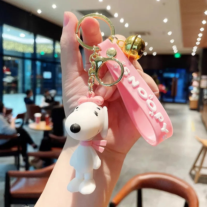 Cute and stylish new Snoopy cartoon dog design for 2026, can be used as a bag charm, backpack pendant, or car keychain.