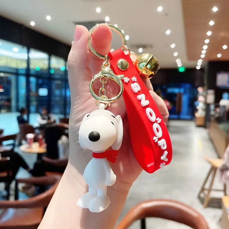 Cute and stylish new Snoopy cartoon dog design for 2026, can be used as a bag charm, backpack pendant, or car keychain.