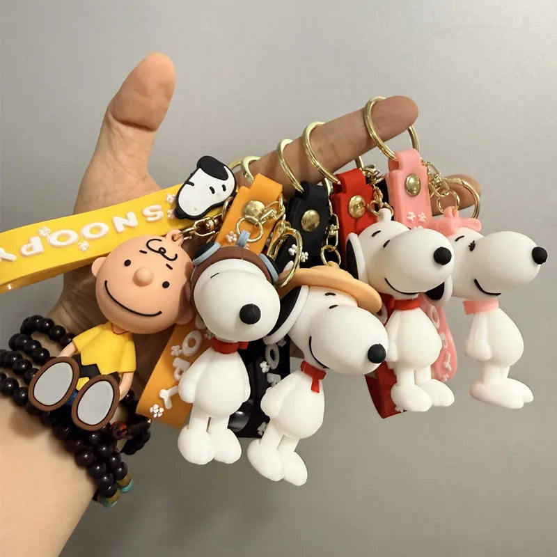 Cute and stylish new Snoopy cartoon dog design for 2026, can be used as a bag charm, backpack pendant, or car keychain.